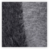 Close-up of dark gray and light gray fur texture on a white background